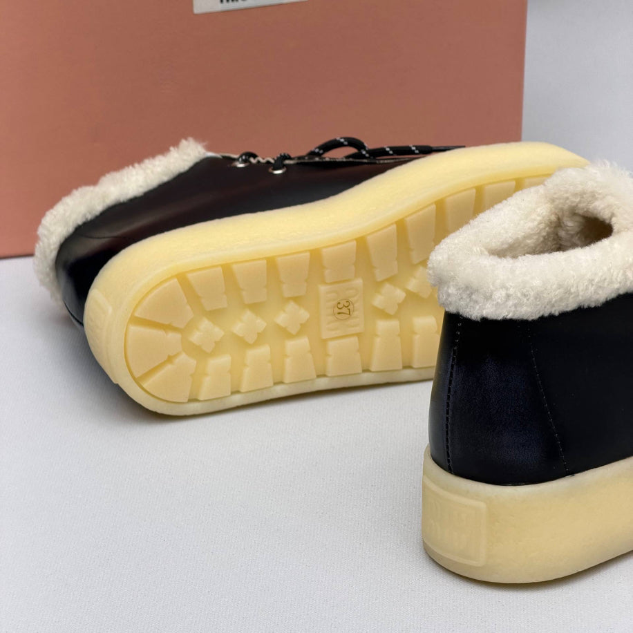 Miu Miu Shearling Lined Leather Moccasin Boots