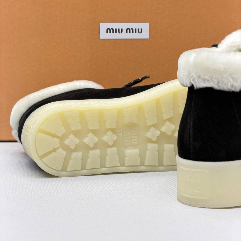 Miu Miu Shearling Lined Leather Moccasin Boots