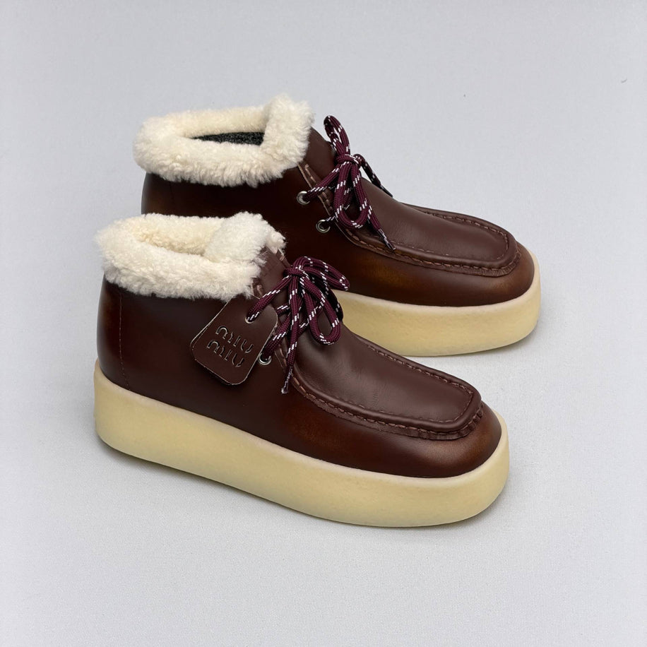 Miu Miu Shearling Lined Leather Moccasin Boots