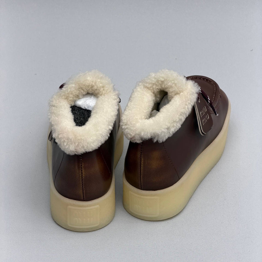 Miu Miu Shearling Lined Leather Moccasin Boots