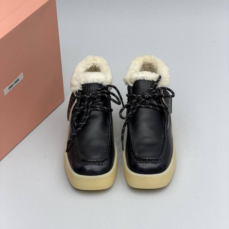 Miu Miu Shearling Lined Leather Moccasin Boots